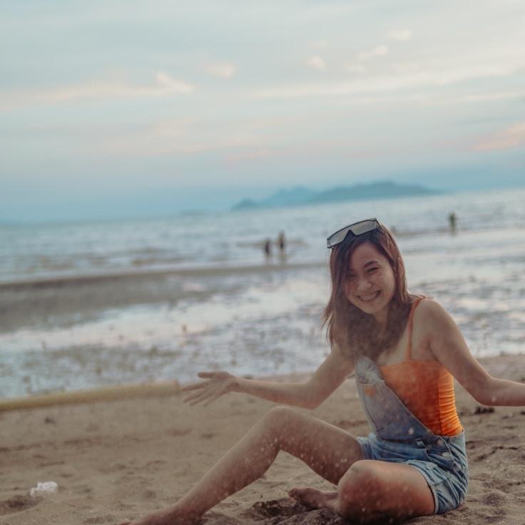 Kaveri Mehta, Lead Design Curator at OrchidMeadowTrail, reviewing corporate floral arrangements